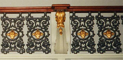 Gold guilding on hand raling.